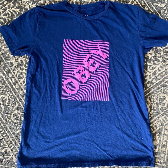 Obey Tops - Obey short sleeve T-shirt dark blue with pink “Obey”
